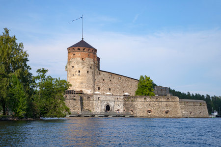 Ancient fortress of Olavinlinna (Olafsborg) close-up on a sunny July evening. Savonlinna, Finlandのeditorial素材