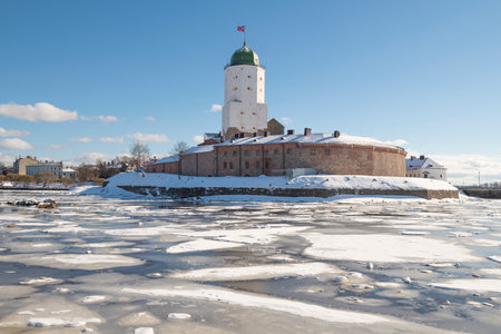 View of the ancient Vyborg castle on a sunny March day. Leningrad region, Russiaのeditorial素材