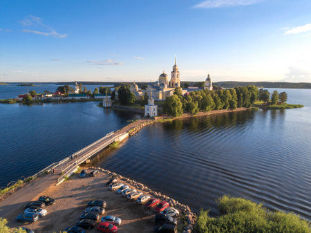 View of the ancient Nilo-Stolobensky monastery on Seliger lake Seliger on a sunny July evening (aerial view). Svetlitsa. Tver region, Russiaの写真素材