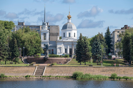 TVER, RUSSIA - JULY 15, 2022: View of the monument to the Russian traveler Afanasy Nikitin and the Church of the Resurrection of Christ on a July afternoonのeditorial素材