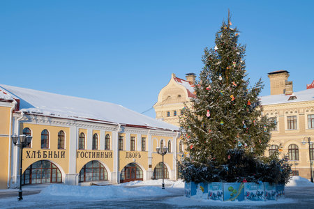 RYBINSK, RUSSIA - JANUARY 06, 2023: New Year's tree at the building of the Bread Trading Yard on a frosty January day. red squareのeditorial素材