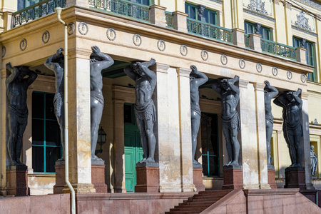 SAINT PETERSBURG, RUSSIA - APRIL 02, 2022: Portico with atlantes of the New Hermitage (1848) close-up on a sunny dayのeditorial素材