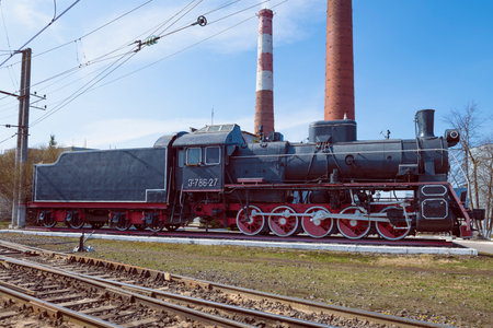 VOLKHOV, RUSSIA - APRIL 17, 2023: Soviet steam locomotive Er-786-27 monument at the locomotive depot of Volkhovstroy 1 station on a sunny April dayのeditorial素材