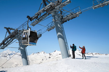 ELBRUS, RUSSIA - JUNE 08, 2023: Tourists take pictures by the cable car to Elbrus mount. Kabardino-Balkariaのeditorial素材