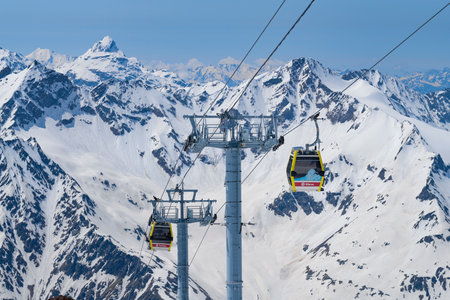 ELBRUS, RUSSIA - JUNE 08, 2023: A section of the high-mountain cable car to Elbrus against the backdrop of the Caucasus Mountainsのeditorial素材