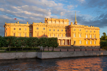 Ancient Mikhailovsky (Engineering) castle in the orange light of the setting sun on a June evening. Saint-Petersburg, Russiaのeditorial素材