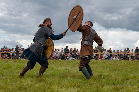 TVER REGION, RUSSIA - JULY 22, 2023: Duel of two swordsmen. Historical festival "Epic Coast-2023"のeditorial素材