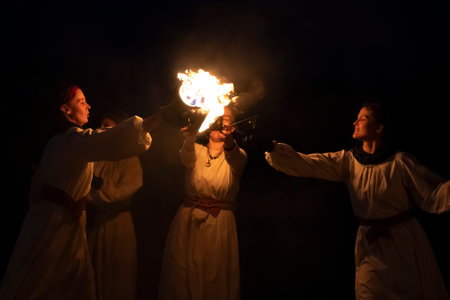 TVER OBLAST - JULY 21, 2023: Night games with fire. A fragment of a fireshaw at the historical...