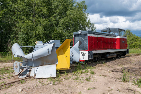TESOVO-NETYLSKY, RUSSIA - JULY 15, 2023: Russian narrow-gauge diesel locomotive TU7A with a trailed snowplow SP-1 on a July dayのeditorial素材
