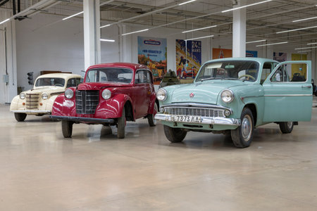SAINT PETERSBURG, RUSSIA - MARCH 29, 2023: Retro cars Moskvich-401 and Moskvich-407 in the exposition of the museum of retro cars. Shopping and entertainment complex "Leto"のeditorial素材