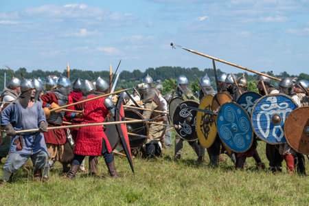 TVER REGION, RUSSIA - JULY 24, 2022: Reconstruction of an early medieval battle on a summer day. Historical festival "Epic Coast-2022"のeditorial素材