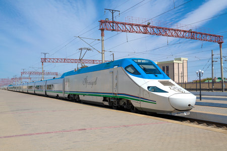 BUKHARA, UZBEKISTAN - SEPTEMBER 11, 2022: Talgo 250 "Afrosiyob" high-speed train at the Bukhara station platform on a sunny dayのeditorial素材