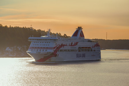 STOCKHOLM ARCHIPELAGO, SWEDEN - MARCH 09, 2019: Tourist cruise ferry "Baltic Princess" at sunrise in the Stockholm archipelagoのeditorial素材