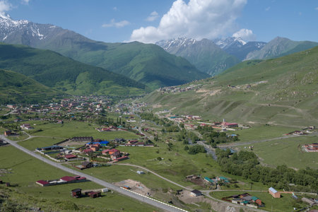 Verkhniy Fiagdon village in a mountain landscape on a sunny June day. North Ossetia-Alania. Russian...