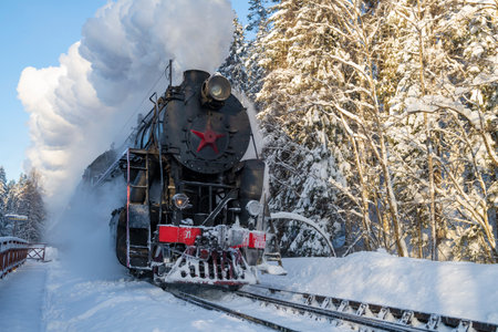 RUSKEALA, RUSSIA - JANUARY 20, 2024: The retro train Ruskeala Express arrives at the Ruskeala...