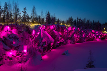 Purple illumination of Marble Canyon on a January late evening. Ruskeala Mountain Park. Karelia, Russiaの写真素材