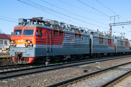 SHARYA, RUSSIA - APRIL 30, 2023: Freight Soviet electric locomotive VL80s in a system of many units (three-section version) on a sunny April day. Northern Railwayのeditorial素材