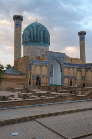 SAMARKAND, RUSSIA - SEPTEMBER 12, 2022: Ancient Gur-Emir mausoleum (Tamerlane's tomb) on an early cloudy September morningの写真素材