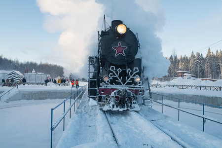RUSKEALA, RUSSIA - JANUARY 20, 2024: Soviet steam locomotive L-3051 (series "L", Lebedyanka) enters the turntable on a frosty January morning. Ruskeala Mountain Park stationのeditorial素材