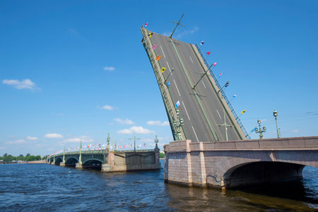 SAINT PETERSBURG, RUSSIA - JULY 29, 2018: Raised Trinity Bridge on a sunny July day. Navy Day in St. Petersburgの写真素材