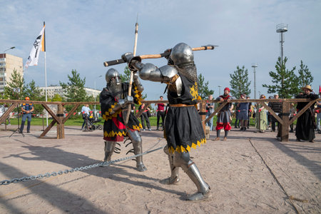 SAINT PETERSBURG, RUSSIA - SEPTEMBER 14, 2024: Halberd duel. Fragment of the Historical Medieval Battle (HMB) tournamentのeditorial素材