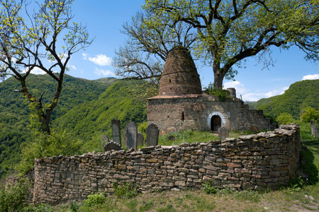 Ancient cemetery and mausoleum in the ancient mountain settlement of Kala-Koreysh on a sunny May...