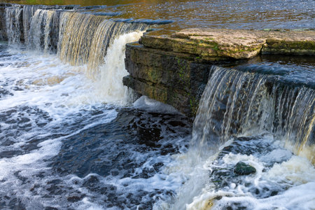 Fragment of Tosna waterfall on a October day. Leningrad region, Russiaの写真素材