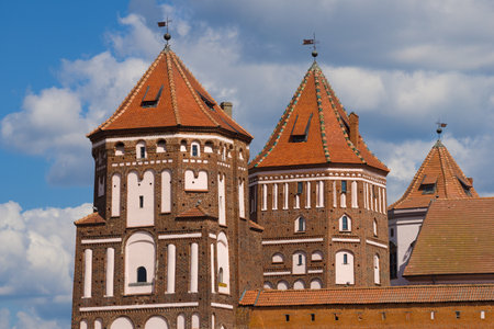 Towers of the Mir Castle close-up on a sunny day. Mir, Belarus