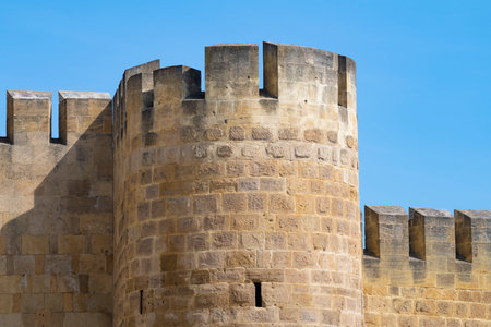 Fragment of the defensive structures of the ancient Naryn-Kala fortress on a sunny day. Derbent. Republic of Dagestan, Russiaの写真素材