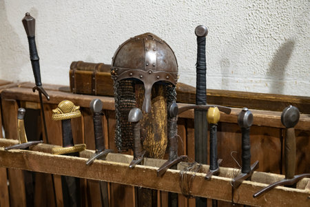 VYBORG, RUSSIA - NOVEMBER 24, 2024: Scandinavian helmet and sword stand. Exhibits of the interactive...