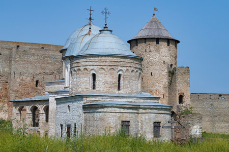 St. Nicholas Church and the Gate Tower of the ancient Ivangorod fortress on a sunny July day. Leningrad region, Russiaの写真素材