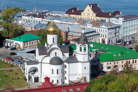 NIZHNY NOVGOROD, RUSSIA - Church of the Kazan Icon of the Mother of God in the urban landscape on a September dayの写真素材