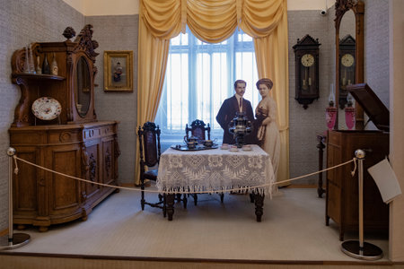 RYBINSK, RUSSIA - JANUARY 05, 2025: Reconstruction of the interior of a living room from the late 19th century in the exposition of the Rybinsk State Historical and Architectural Art Museumのeditorial素材