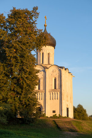 At the medieval Church of the Intercession of the Holy Virgin on the Nerl on a sunny September evening. Vladimir region, Russiaの写真素材