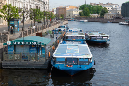 SAINT PETERSBURG, RUSSIA - JUNE 02, 2024: Pleasure motor boats at the Anichkov Bridge pier on a June morningの写真素材
