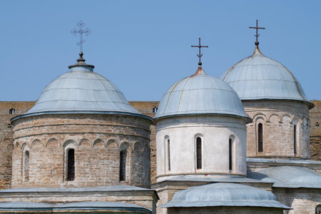 Three houses of ancient churches of Ivangorod fortress close-up on a sunny July day. Ivangorod, Leningrad region. Russiaの写真素材