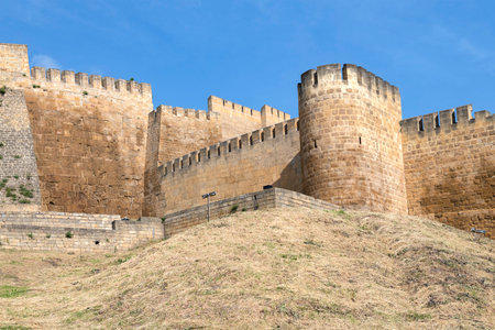 A fragment of the defensive fortifications of the ancient fortress of Naryn-Kala on a sunny May day....