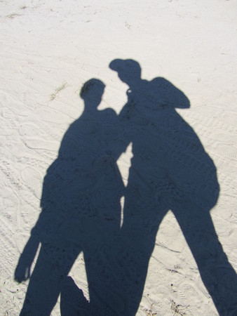 Shadow of tourist on the ground,Shadow of couples like to travelの写真素材