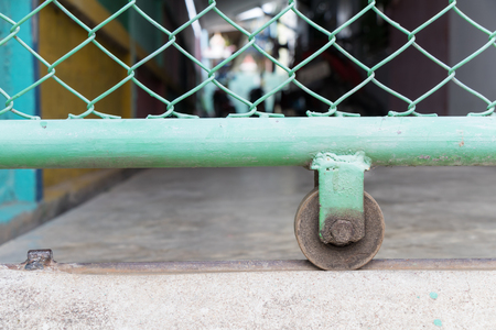Slide door with wheel bearing or Caster steel wheels fenceの写真素材