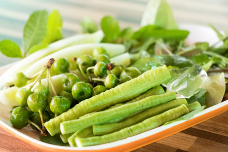 fresh vegetable are in the plate ready to eatの写真素材