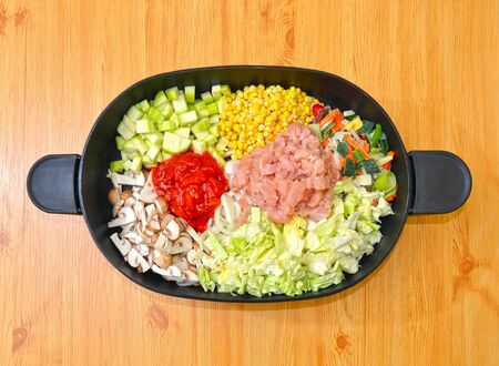 Slow cooker filled with ingredientsの写真素材