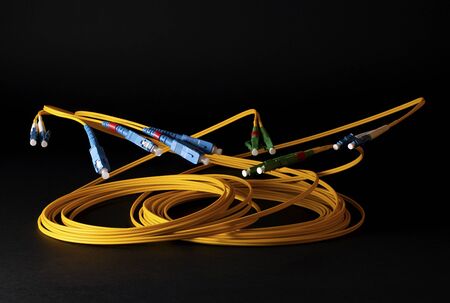 Optical Cables on black backgroundの写真素材