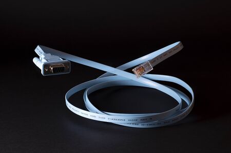 Router console cable on black backgroundの写真素材