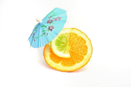 Orange with cocktail umbrellaの写真素材