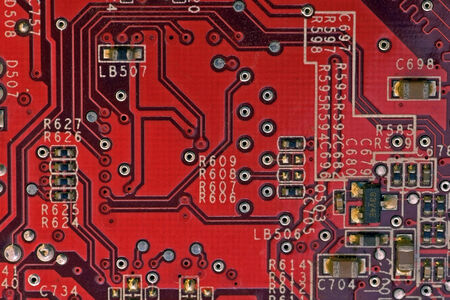 closeup of red circuitboardの写真素材