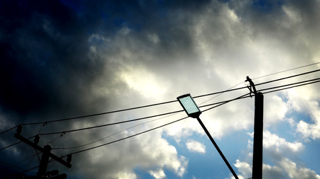 LED or Light Emitting Diode street lighting and Electronic and cable line in country in the morning.の写真素材