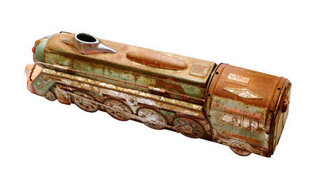 Train antique rusty toy on white background isolate.