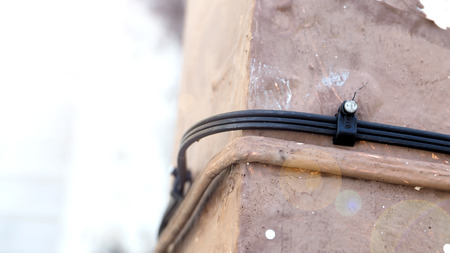 Fiber optic line WIFI at home installed on the cement concrete balcony of the house has copy space...