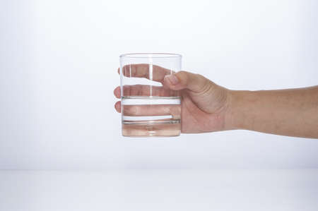 glassware with hand
