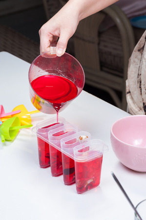 ice pop making processの写真素材